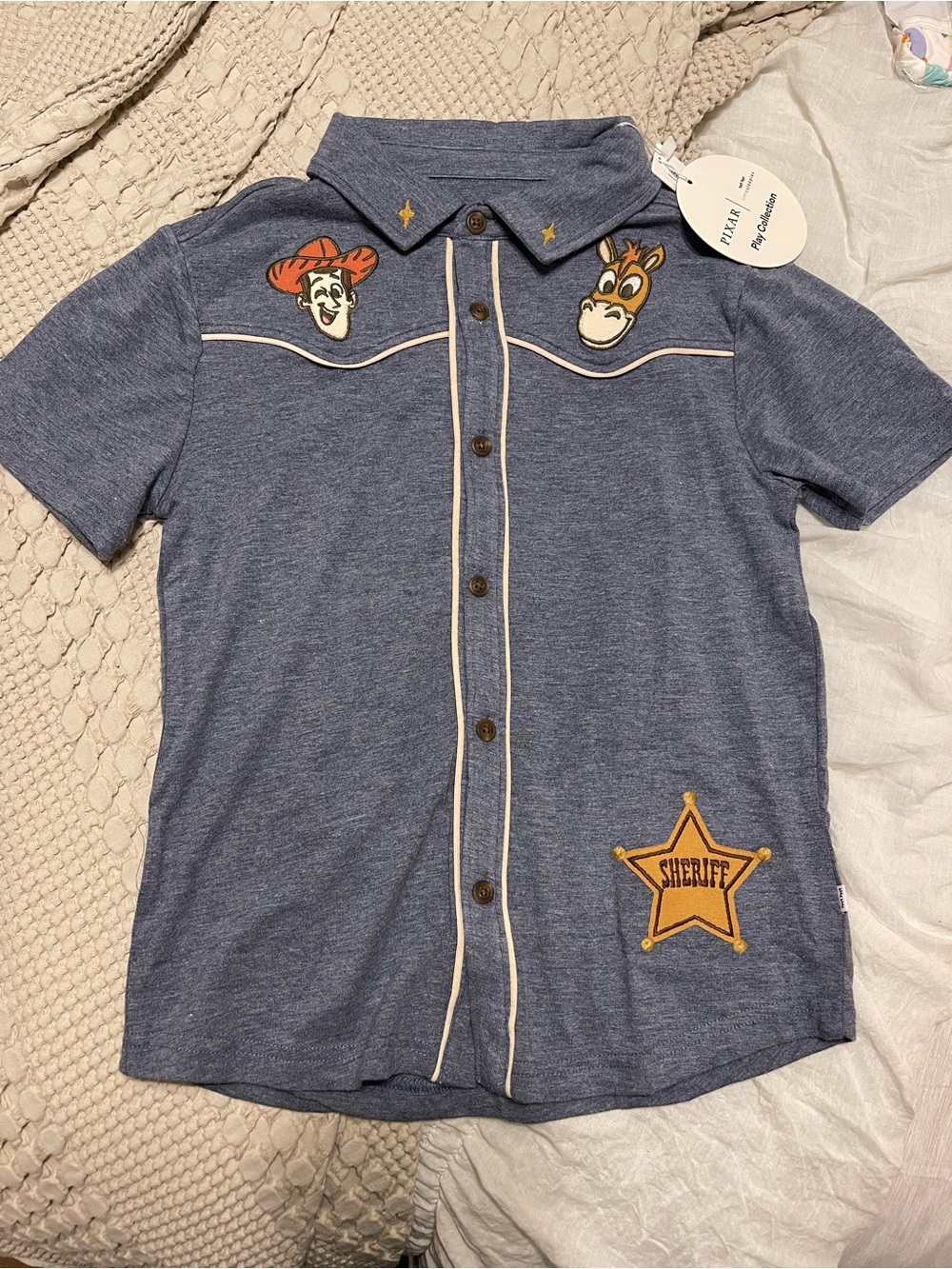 Little Sleepies Toy Story Blue ‘Roundup Gang’ Sheriff Polo